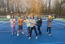 Photo of a group of kids on pickleball court
